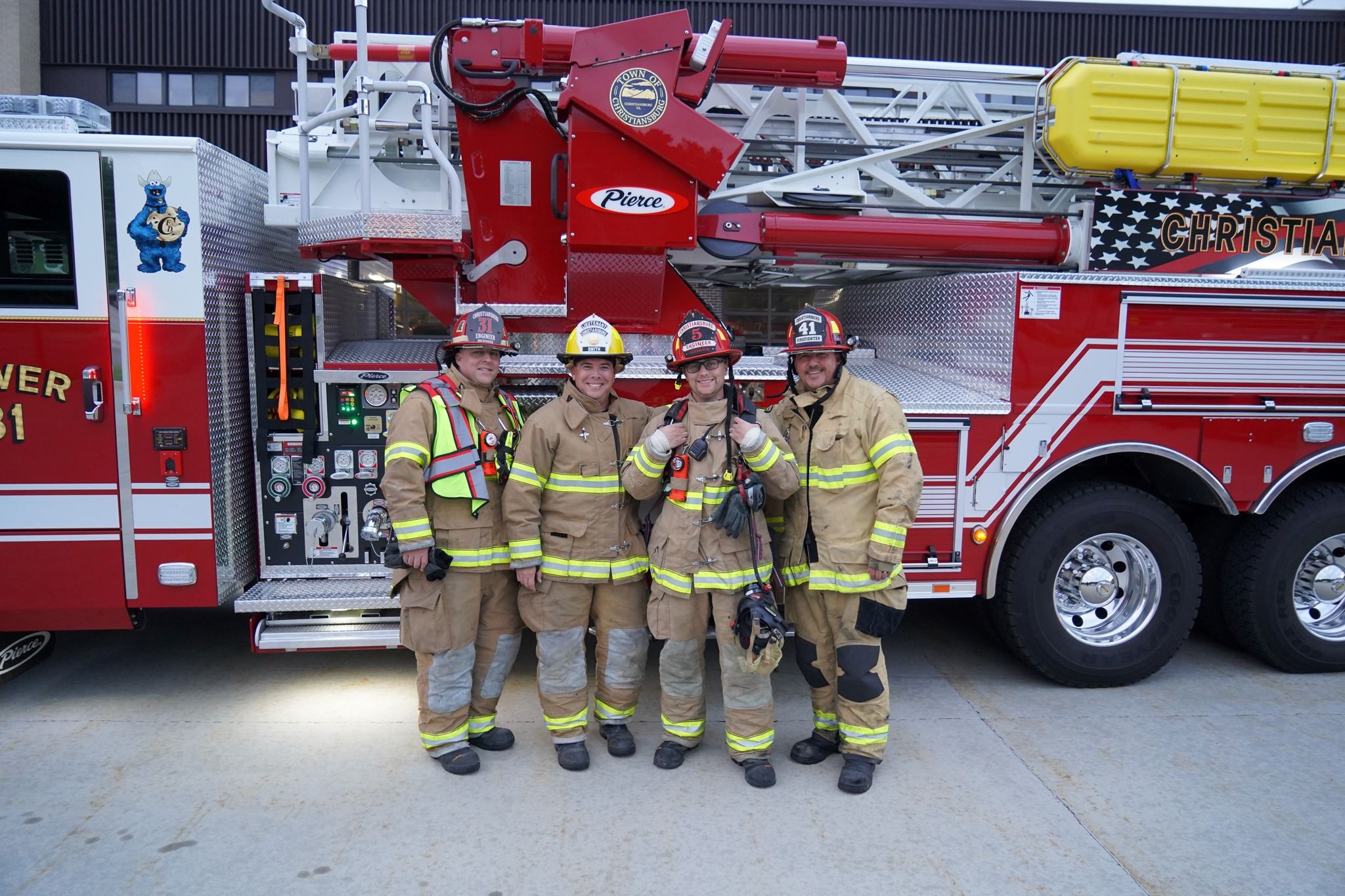Photo of four, volunteer fire fighters